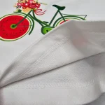 بلوز دخترانه طرح رگلان دوچرخه - Image 7